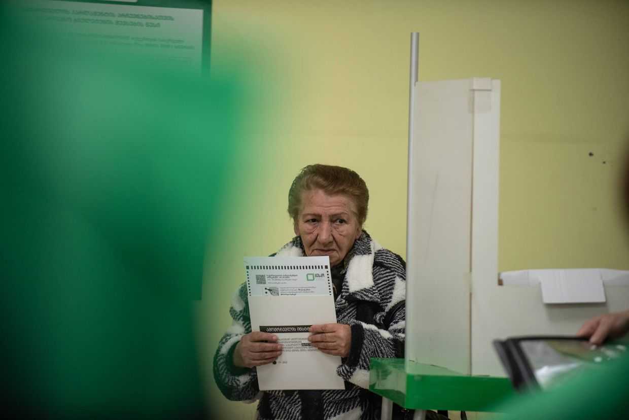 A woman votes in Tbilisi during the October 2024 parliamentary elections. Photo: Mariam Nikuradze/OC Media.