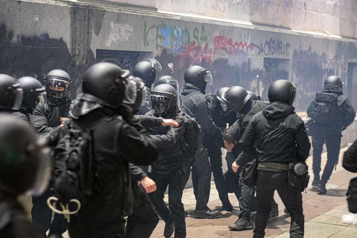 Masked police detain a protester in Tbilisi. Photo: Mariam Nikuradze/OC Media.